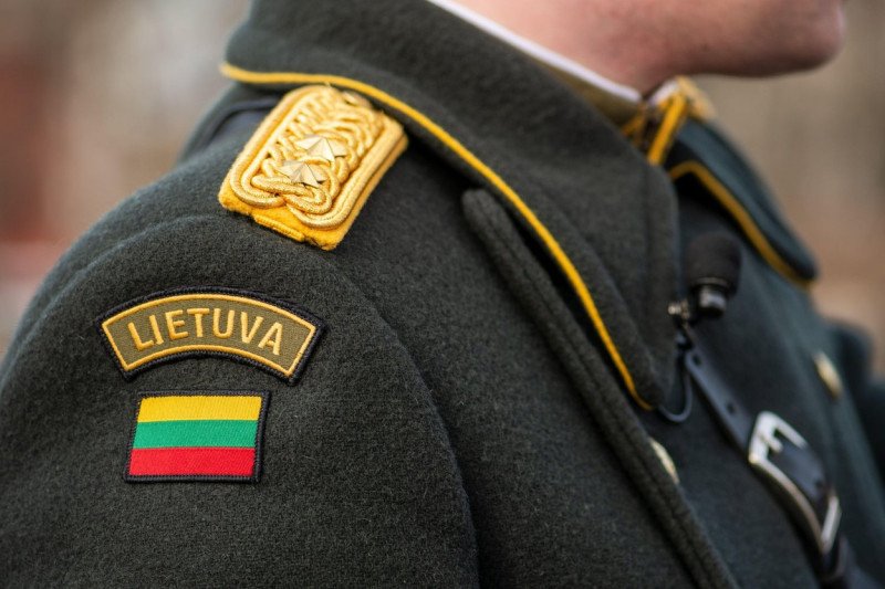 Flag of Lithuania, Lithuanian Armed Forces on a soldier elegant uniform, NATO force integration unit, close up