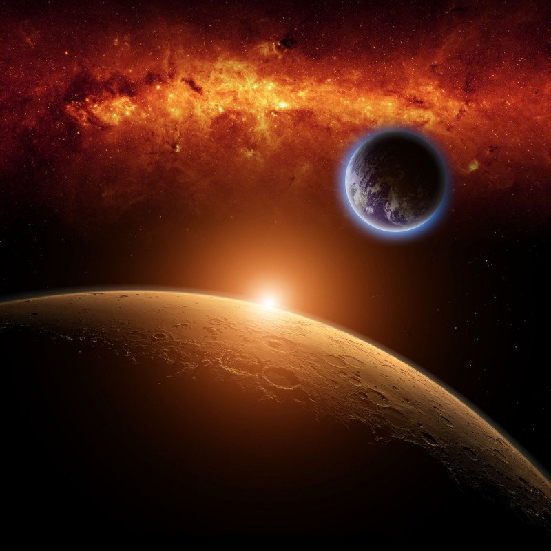 Planets Earth and Mars in space, red galaxy, bright red sun. Elements of this image furnished by NASA/JPL-Caltech
