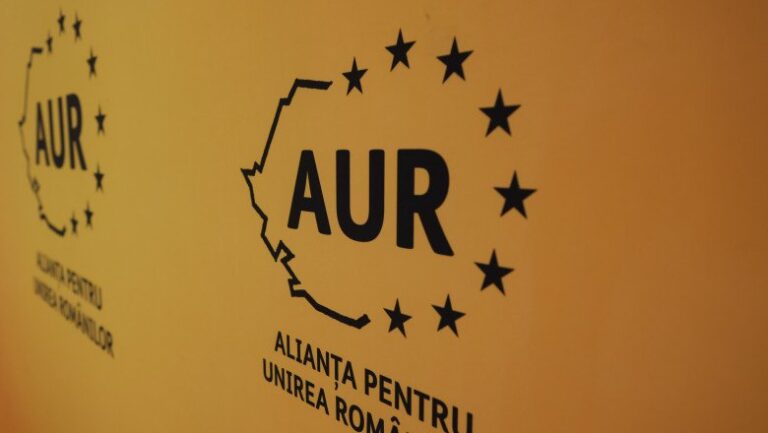 Reacția AUR după ce Bolojan a anunțat că vrea să vândă acțiuni la companiile de stat